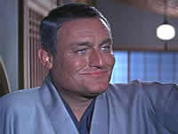henderson1 Henderson, spilt av Charles Gray